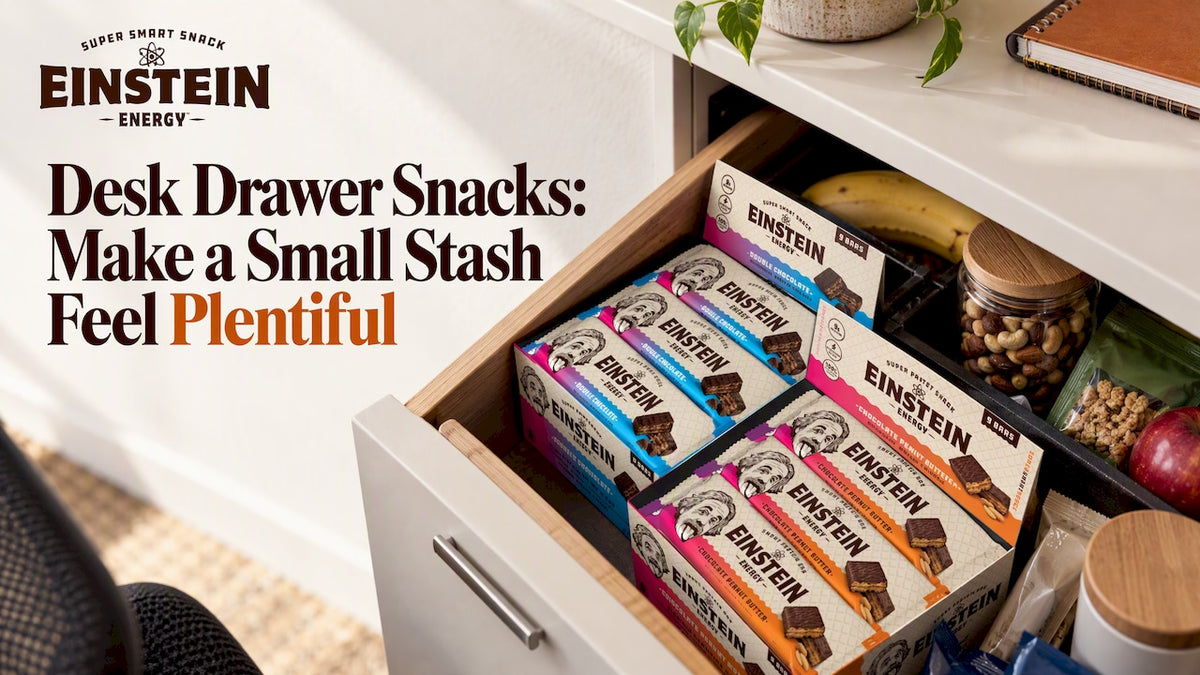 Snack stash arranged inside an open desk drawer